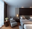 أثاث غرفة نوم فندق مخصص مجموعات سرير خشب الجوز القشرة E1 الخشب الرقائقي